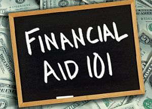 Chalkboard with the words FINANCIAL AID  101 laid on top of a pile of money