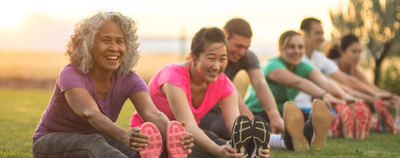 Fitness group warming up for a class